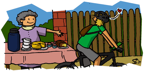 Juja auf dem Rad vor einer freundlichen Omi mit Kuchenbasar und Kaffeekanne vor sich auf dem Tisch